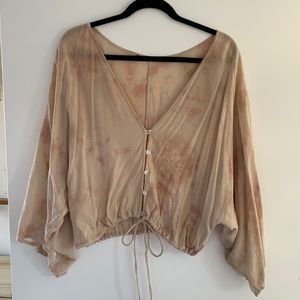 Planet blue, tan, tie-die flowy blouse.